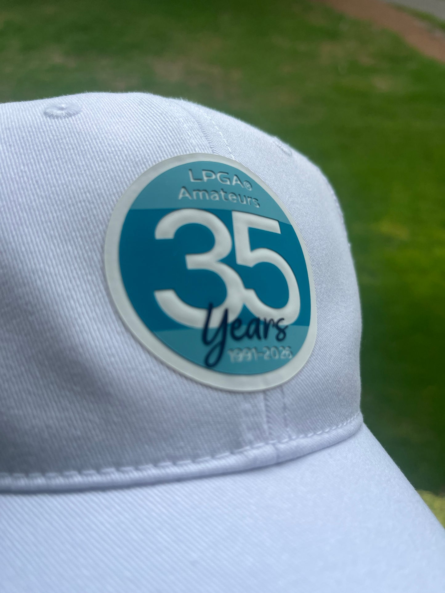 Hat- Unstructured Trucker White Silicone Textured Logo